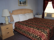 Room with one king size bed and sleep sofa