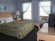 Room with one queen size bed