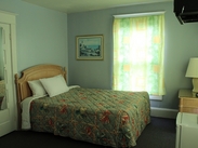 Room with one queen size bed