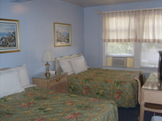 Room with two double beds